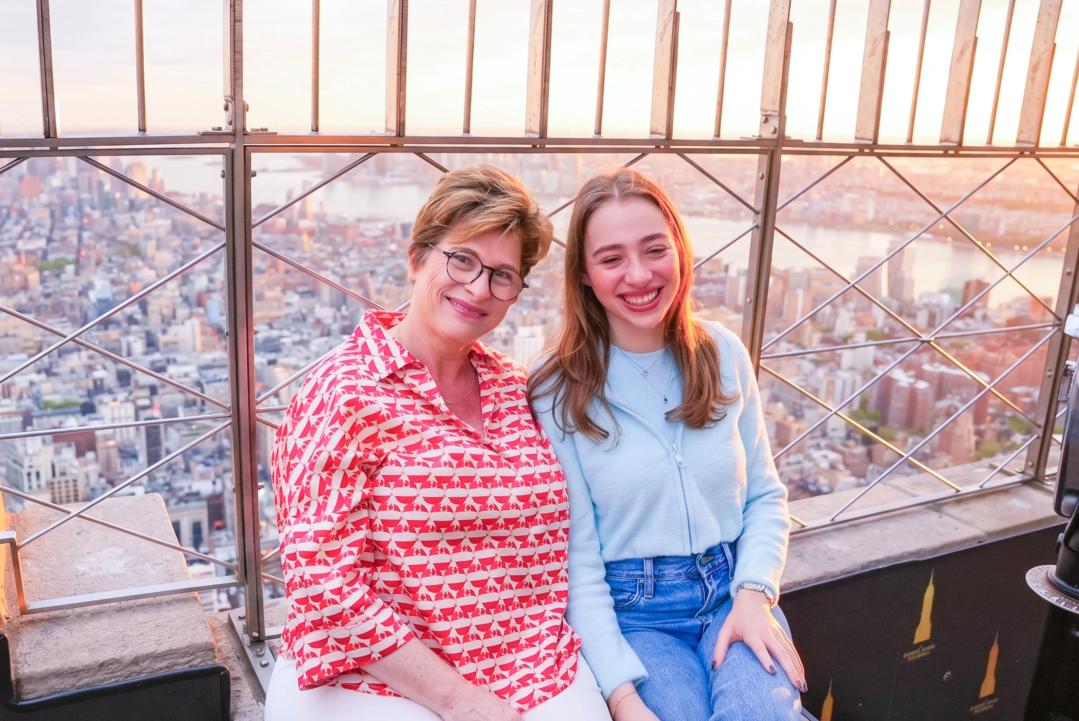Mother and daughter in front of incredible NYC views